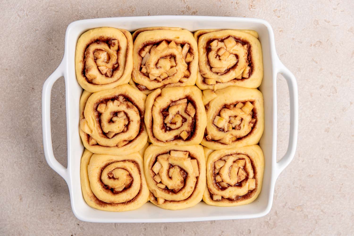 Apple Cinnamon Rolls Risen in Casserole Dish