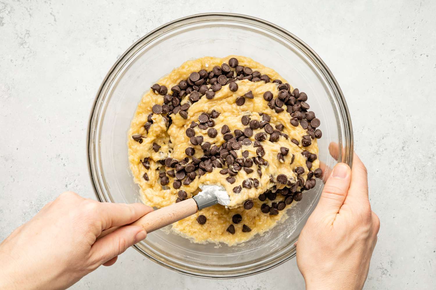 Chocolate Chips Folded Into Chocolate Chip Banana Bread Coffee Cake Batter 