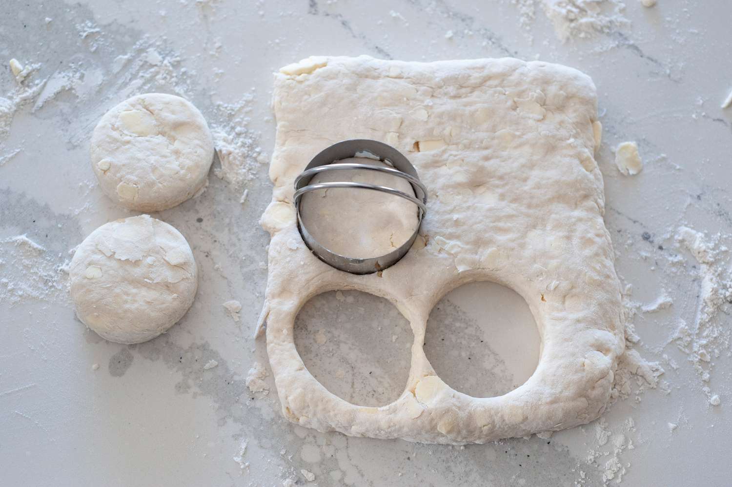 Cutting out biscuits from dough