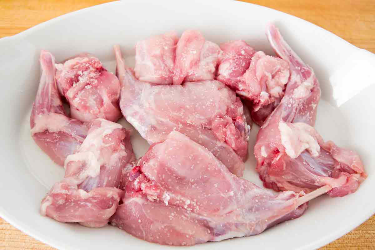 sprinkle rabbit pieces with salt for braised rabbit dish