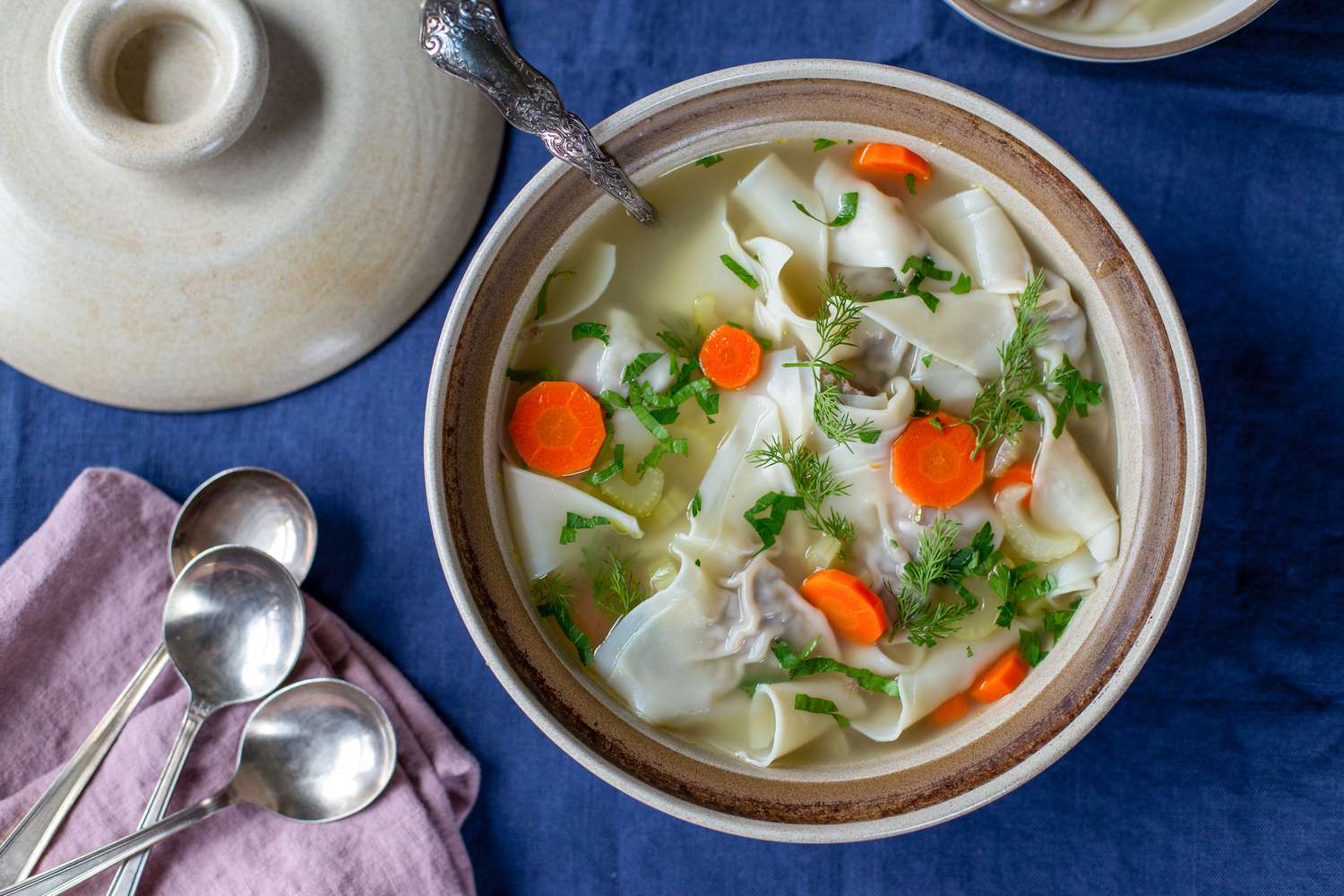 Easy beef kreplach in chicken broth with carrots and celery 