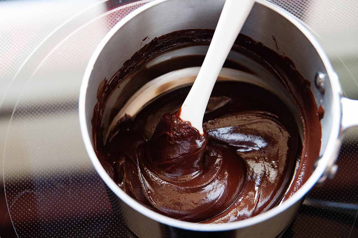 Melted chocolate to add to the perfect chocolate cheesecake.