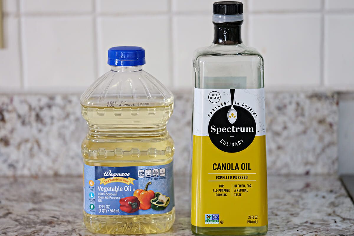 How to Season a Cast Iron Pan - two bottls of vegetable oil