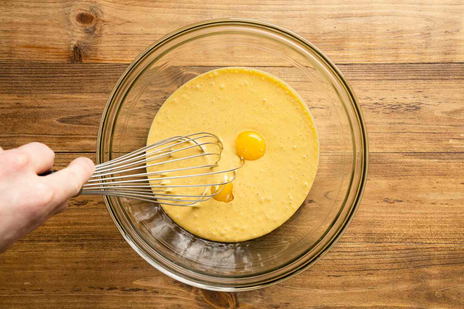 Melted Ice Cream and Egg Yolks in a Bowl for 3-Ingredient Pumpkin Spice Crème Brûlée Recipe