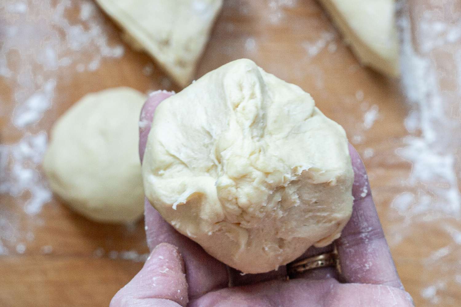 Shaping dough to make the fluffiest brioche buns.
