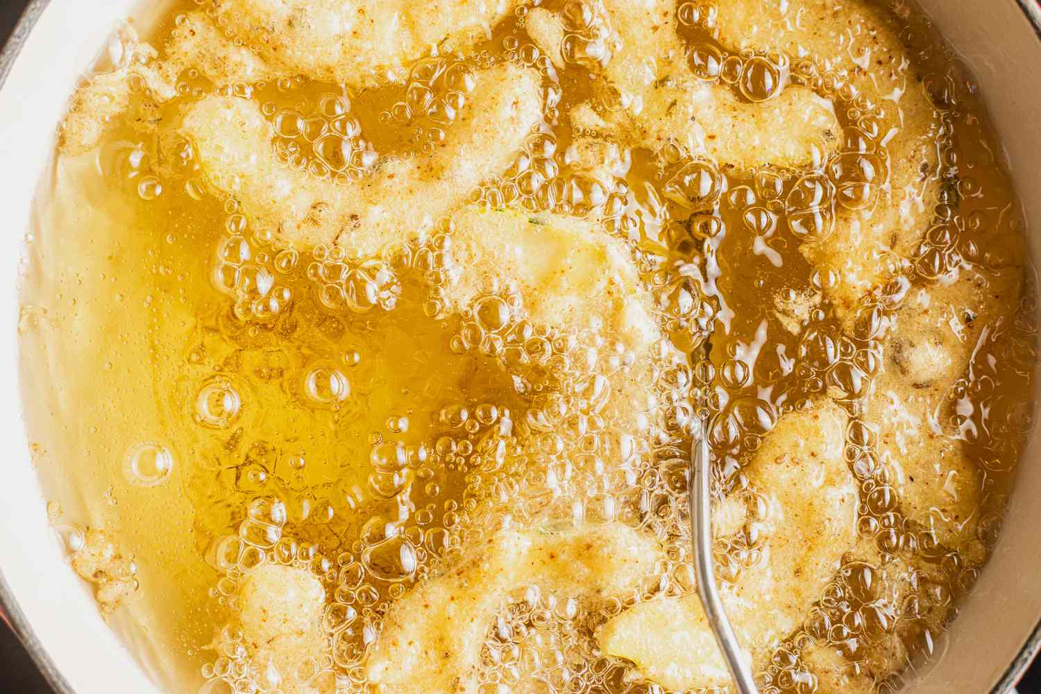 Delicata Squash Pakoras Fried in a Pot of Oil