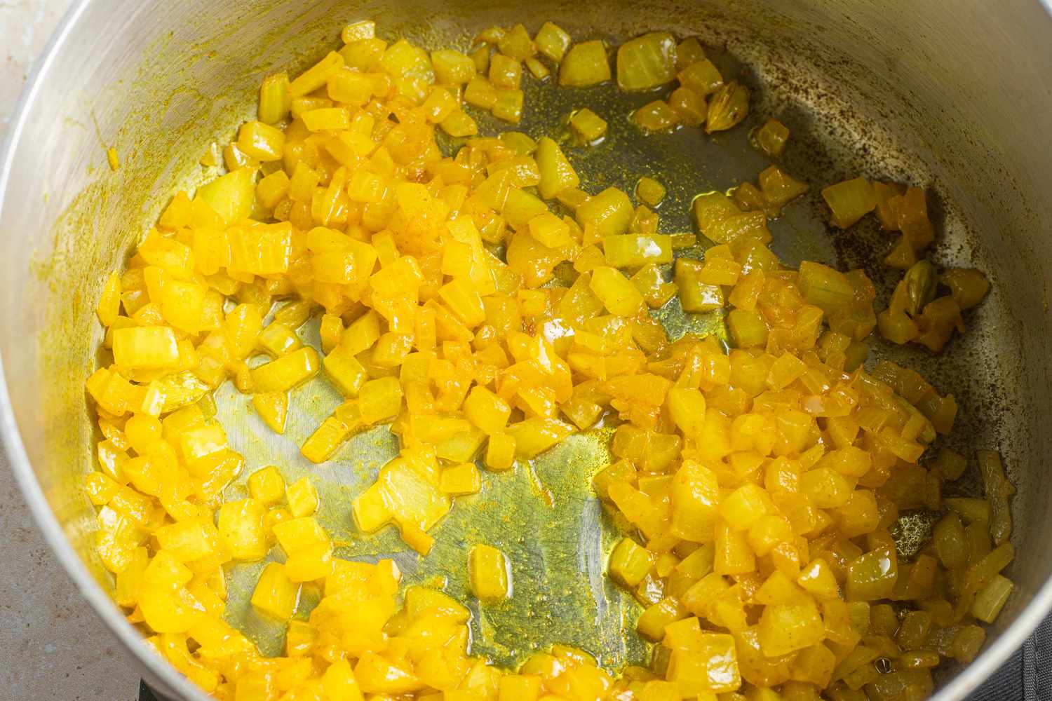Onions SautÃ©ed With Turmeric in a Pot 