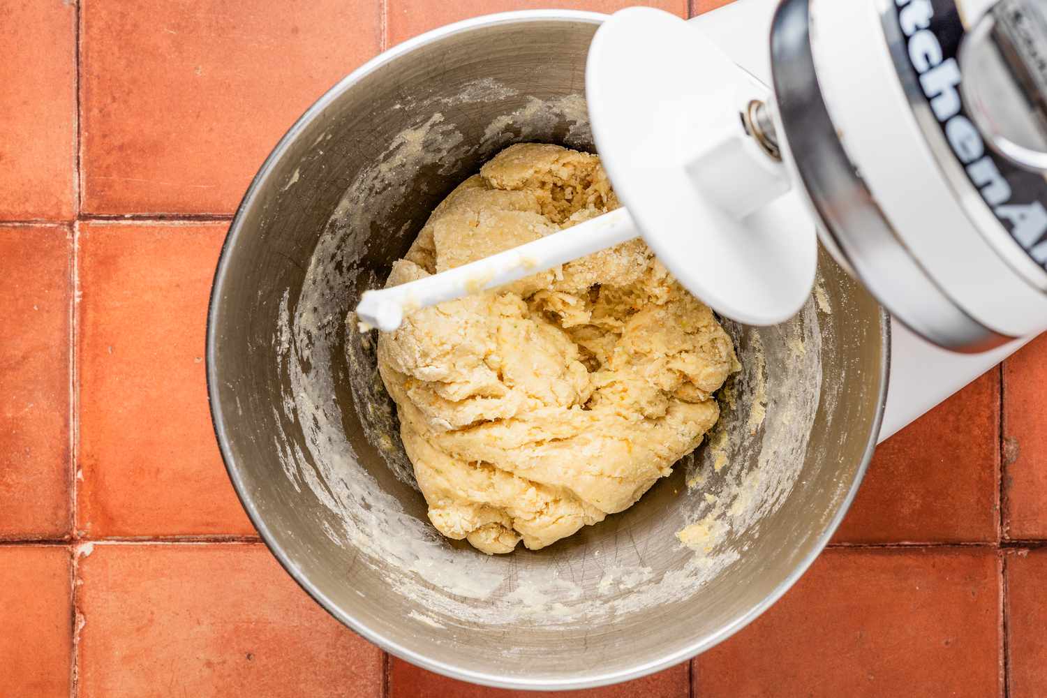 Pan de muerto dough in the mixer bowl (still slightly sticking to the edges of the bowl)
