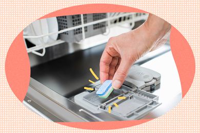 Dishwasher detergent tablet placed in the dishwasher's dispenser 