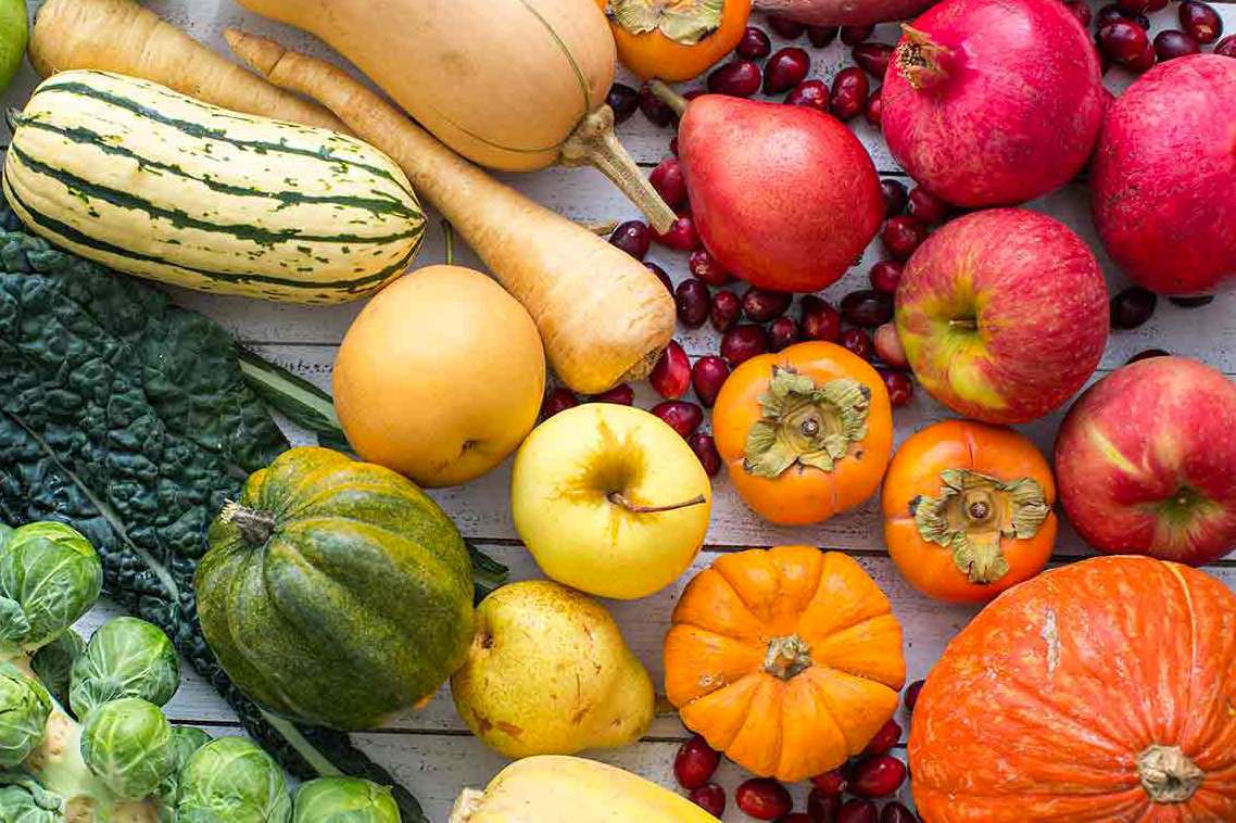 overhead view of fruits and vegetables that are in season for fall