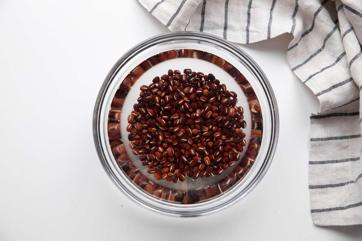 Adzuki Beans Soaking in a Bowl of Water for Red Bean Tangyuan Recipe