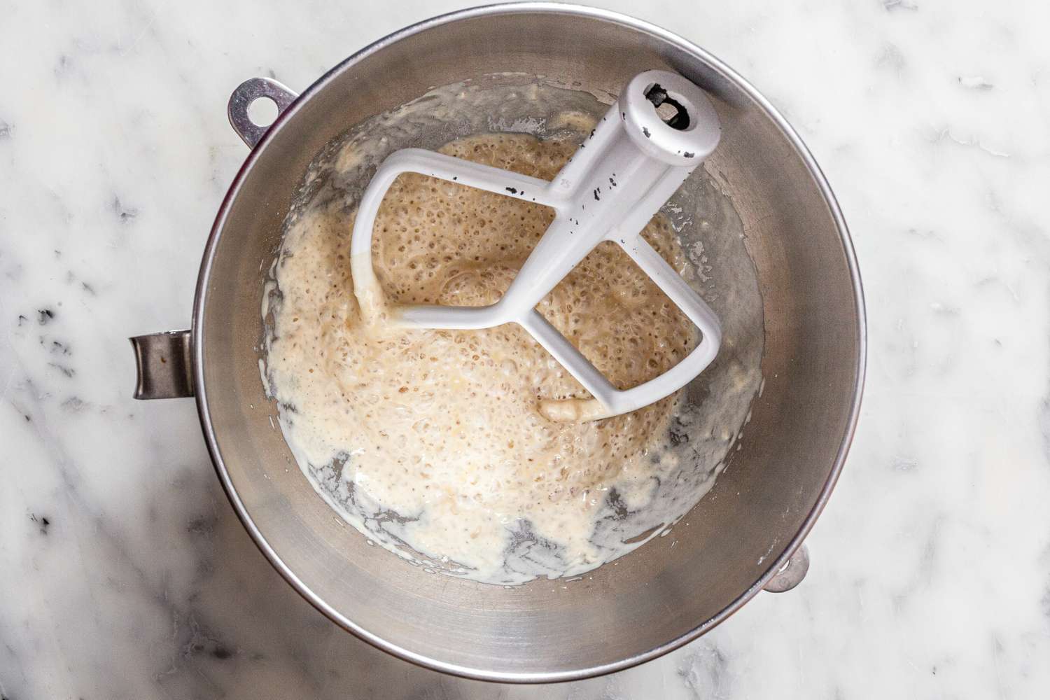 Flour, Yeast, and Water Whisked Together in a Mixer Bowl for Cinnamon Swirl Raisin Brioche Loaf Recipe