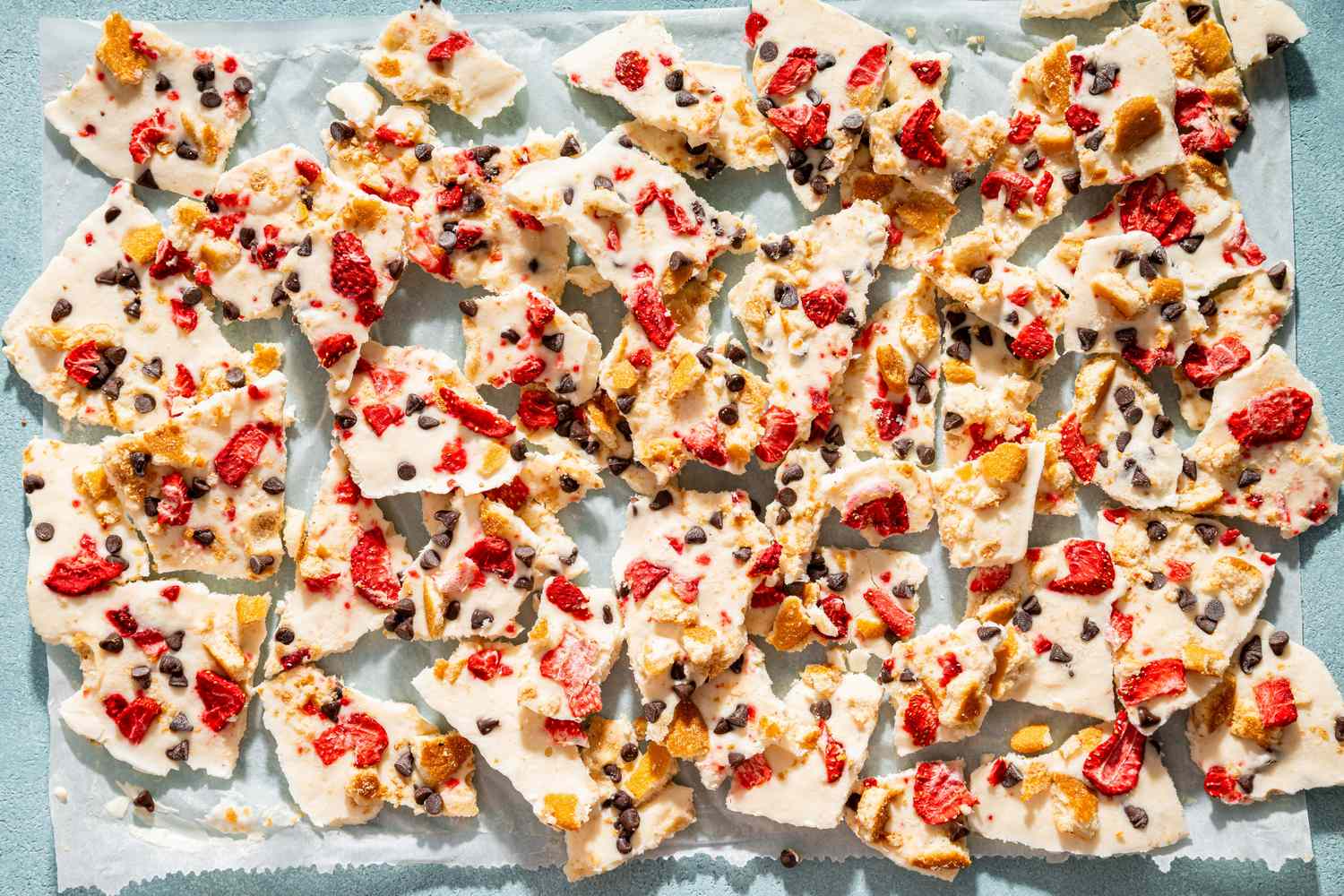 Fro-Yo Bark pieces on a sheet of parchment paper