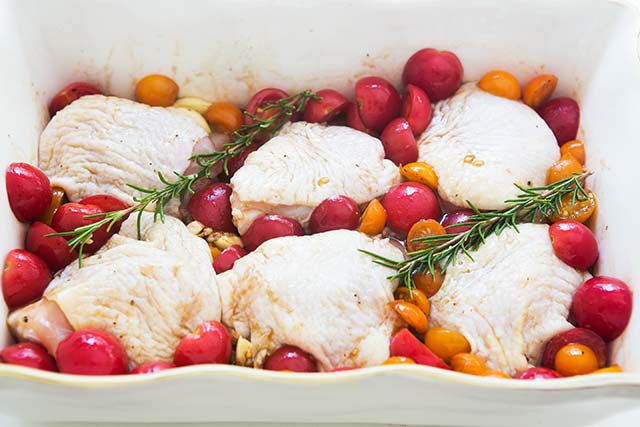 Bone-in skin-on chicken thighs in a dish