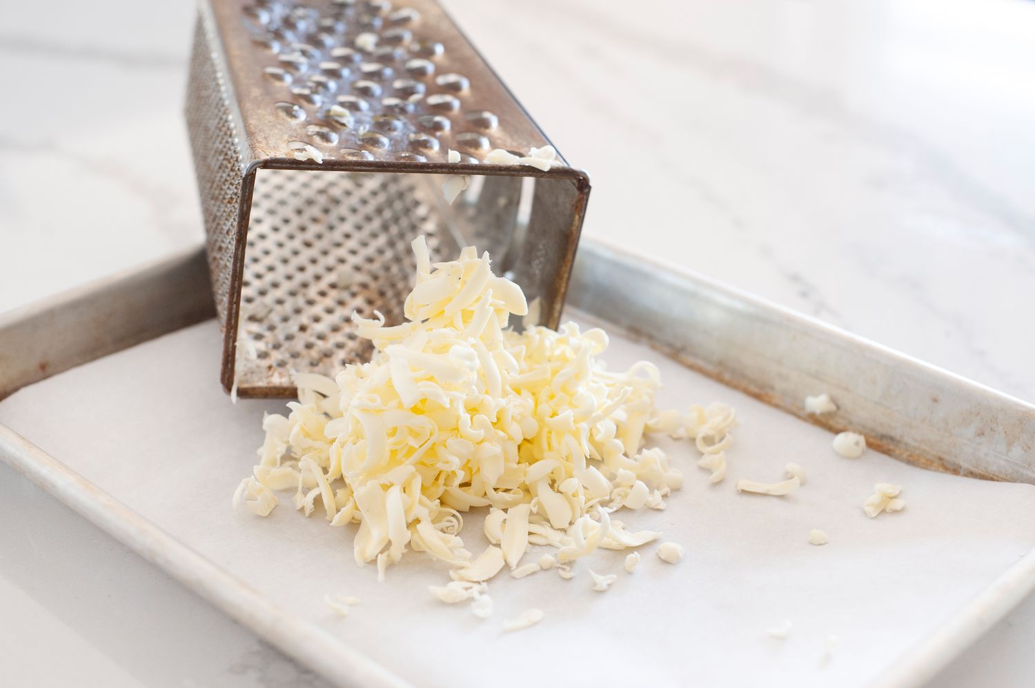 Grated butter to make a Basic Scone Recipe.