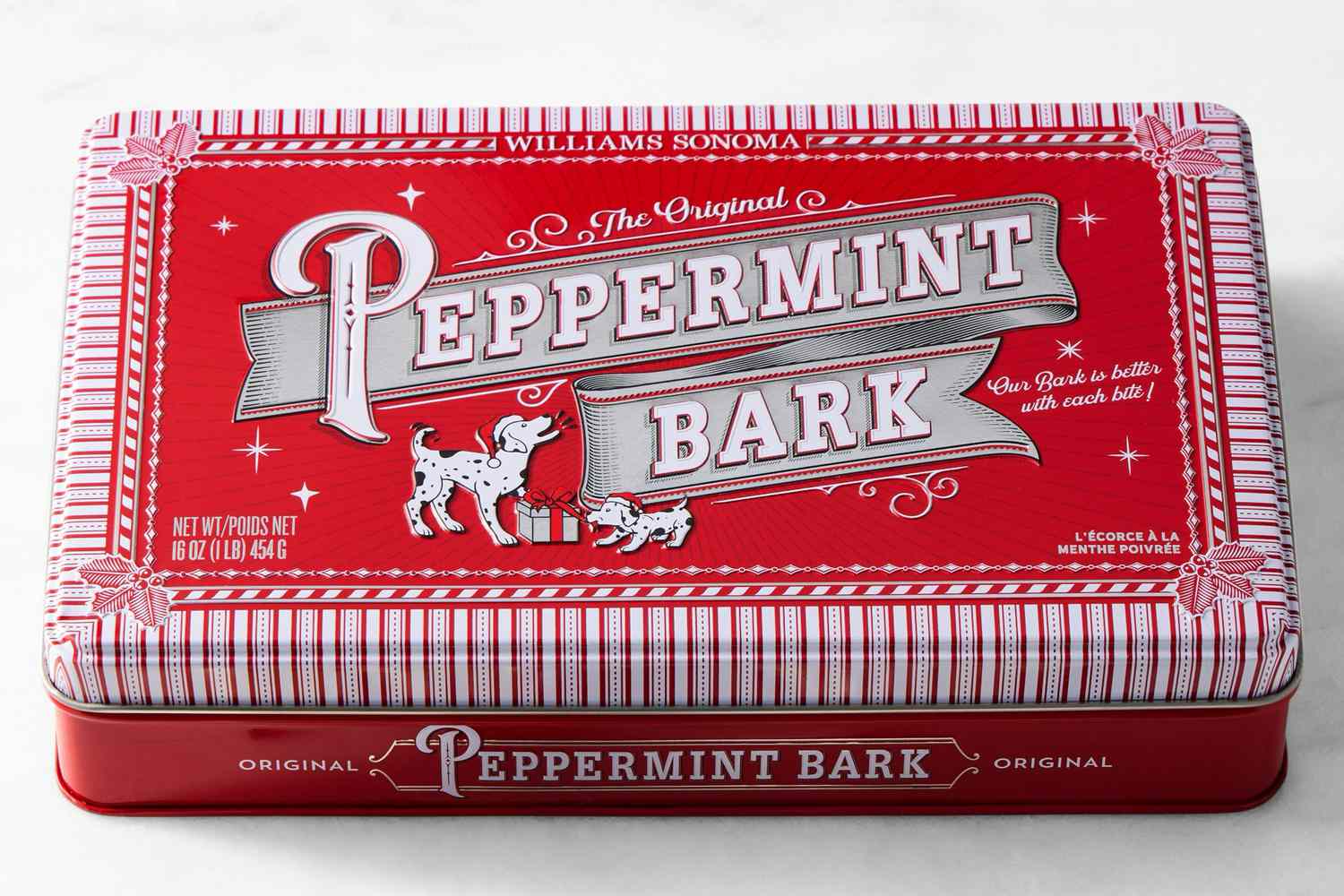 Image of a metal tin of The Original Williams Sonoma Peppermint Bark on a white background