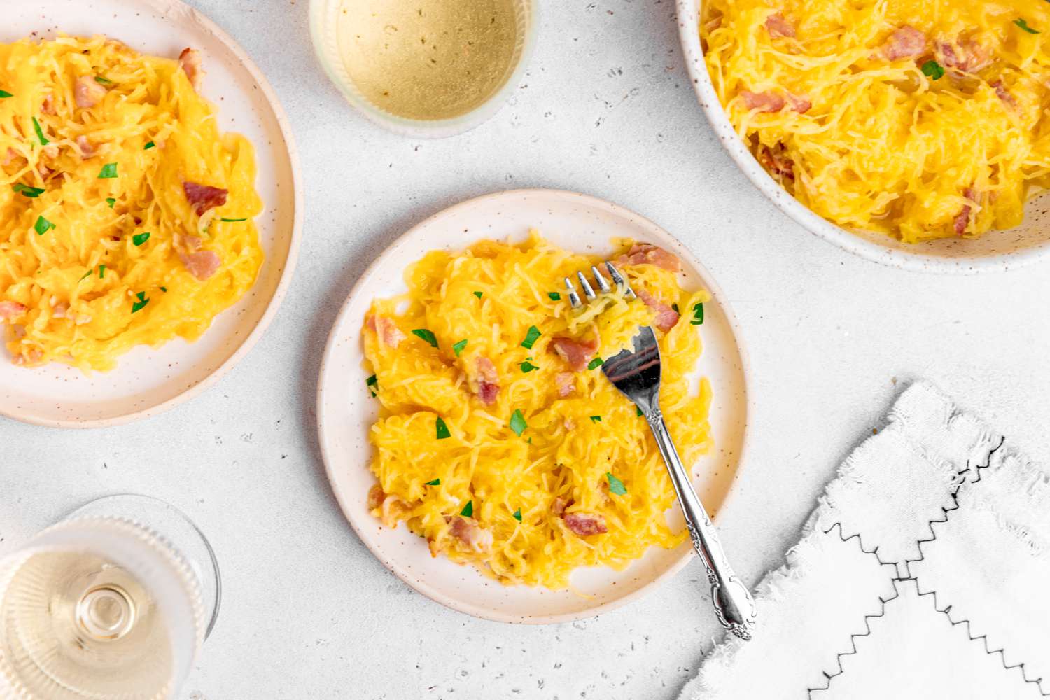 Spaghetti Squash Carbonara on Two Plates and More in a Bowl 