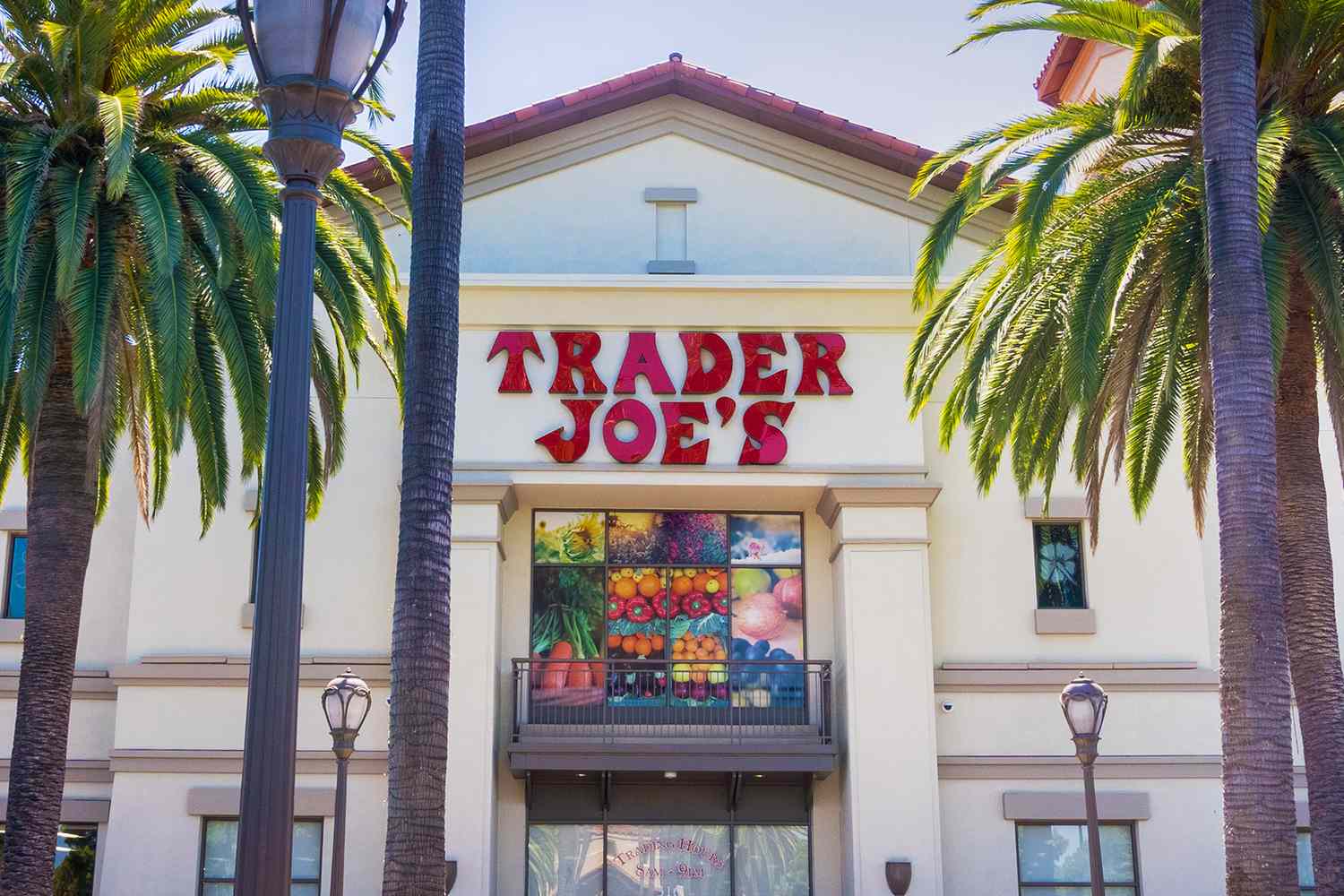 Trader Joes market with colorful produce under the logo