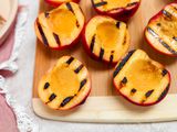 Grilled Peaches on a Wood Board