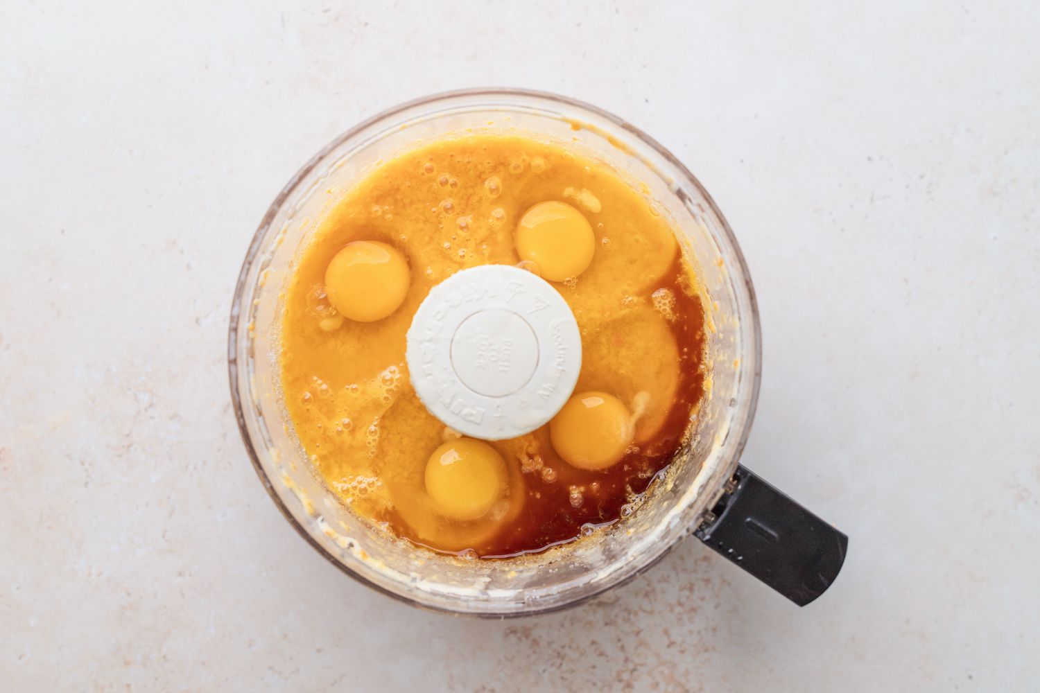 Add eggs, almond extract, and vanilla extract.