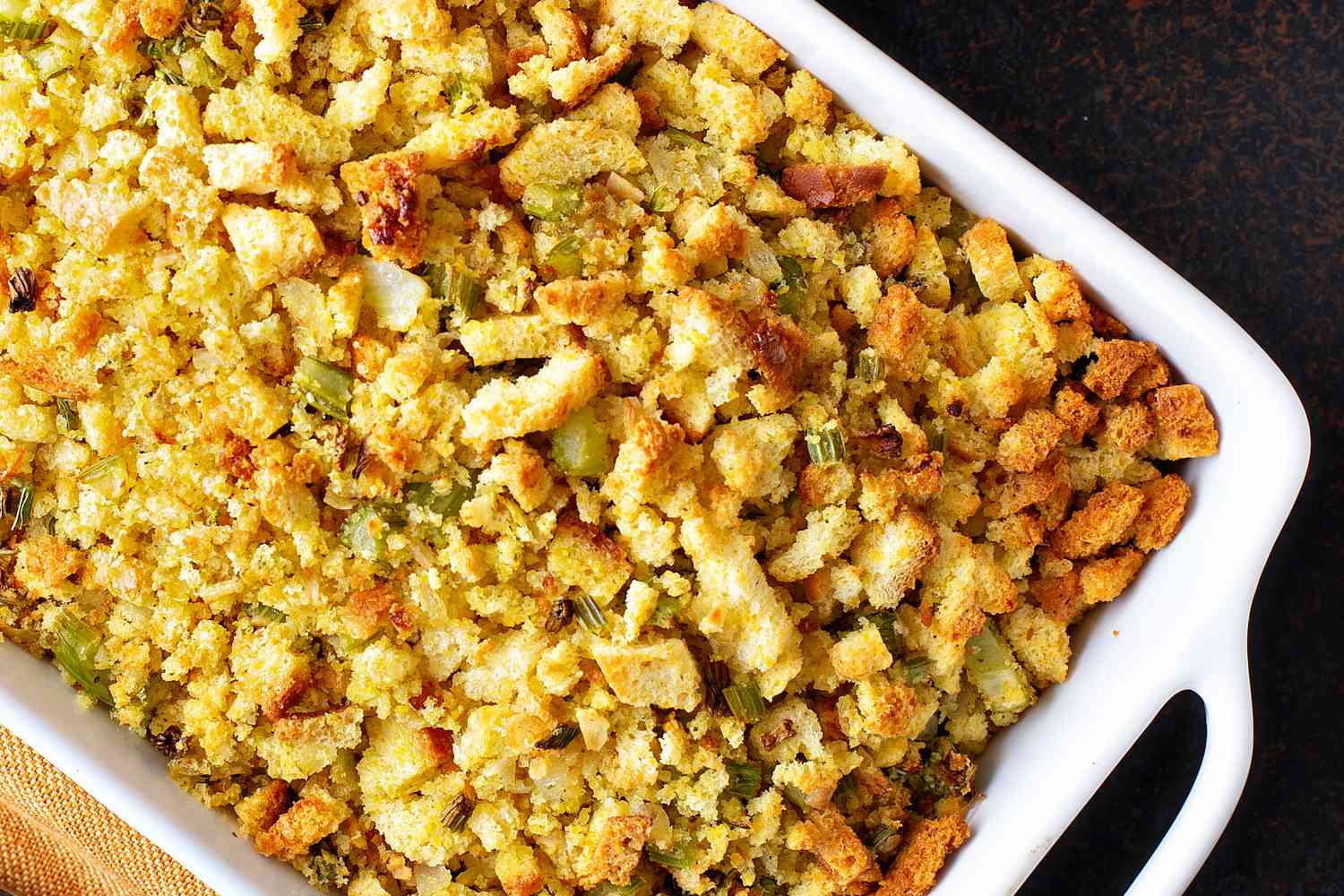 A white baking dish with stuffing