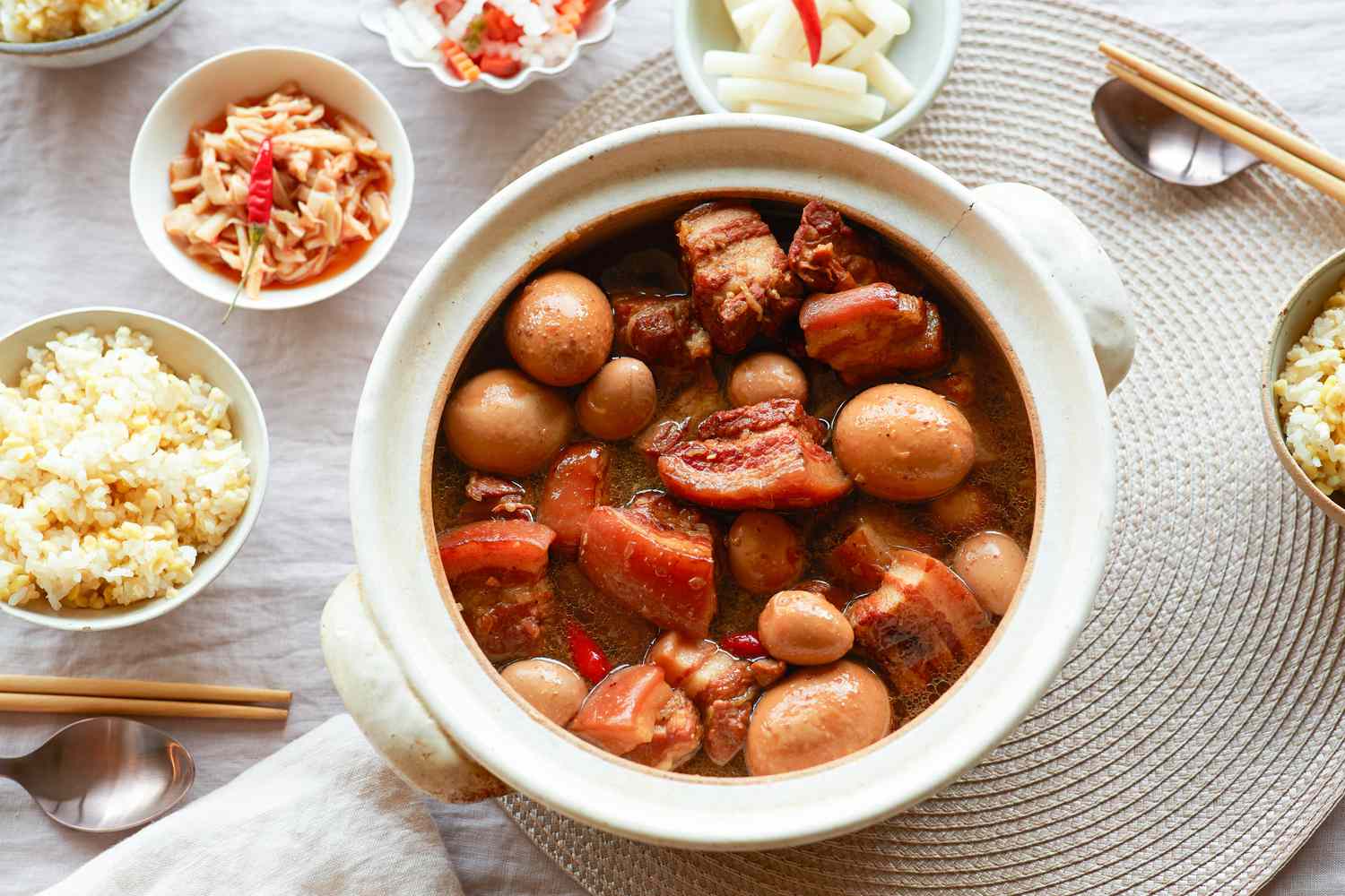 Overhead view of a pot of Sweet and savory braised pork belly.