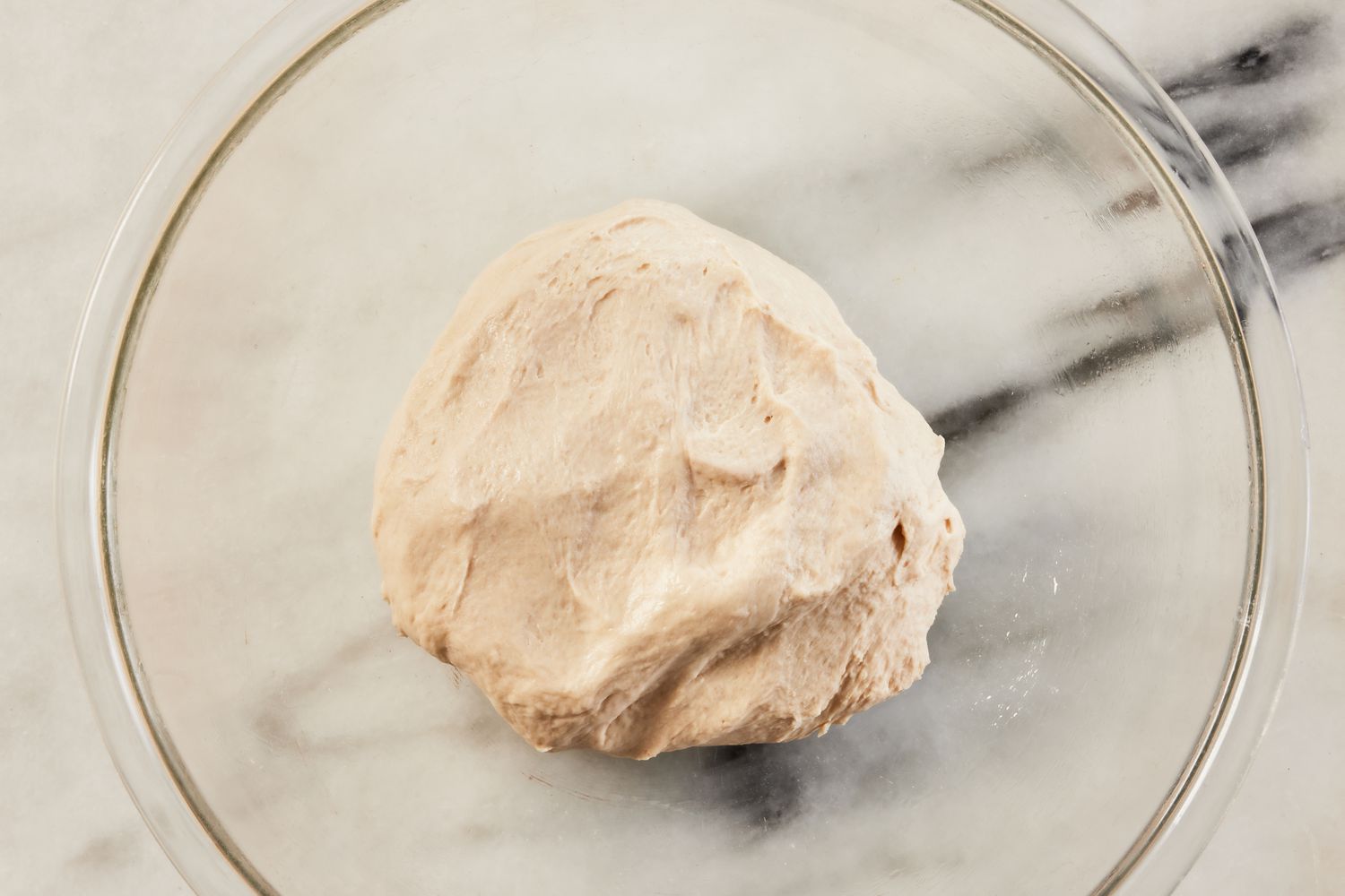 grandma pizza dough in a bowl 