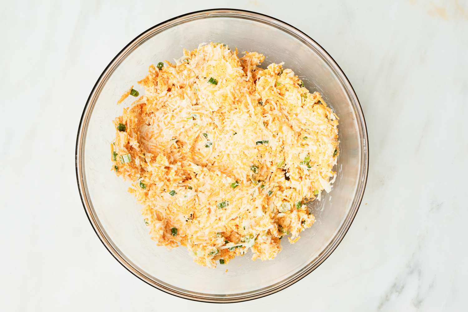 Bowl of Garlic Butter and Cheese Mixture for Cheesy Bread Recipe