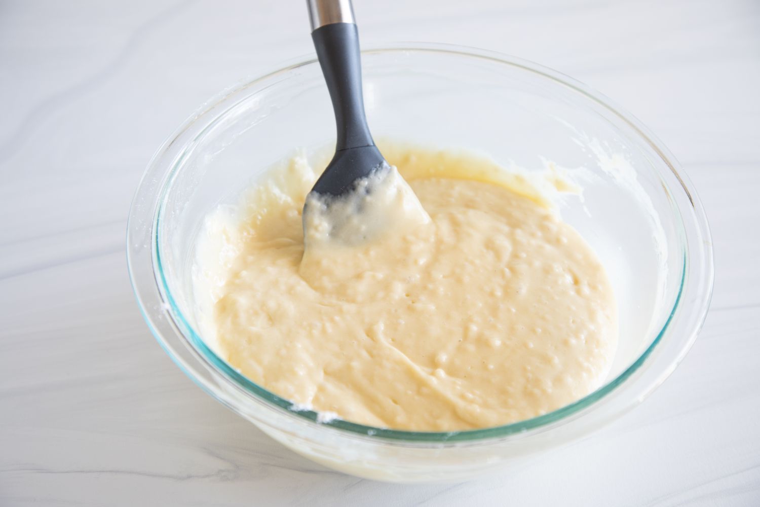 Batter for Quick and Easy Yogurt Cake in a glass bowl.