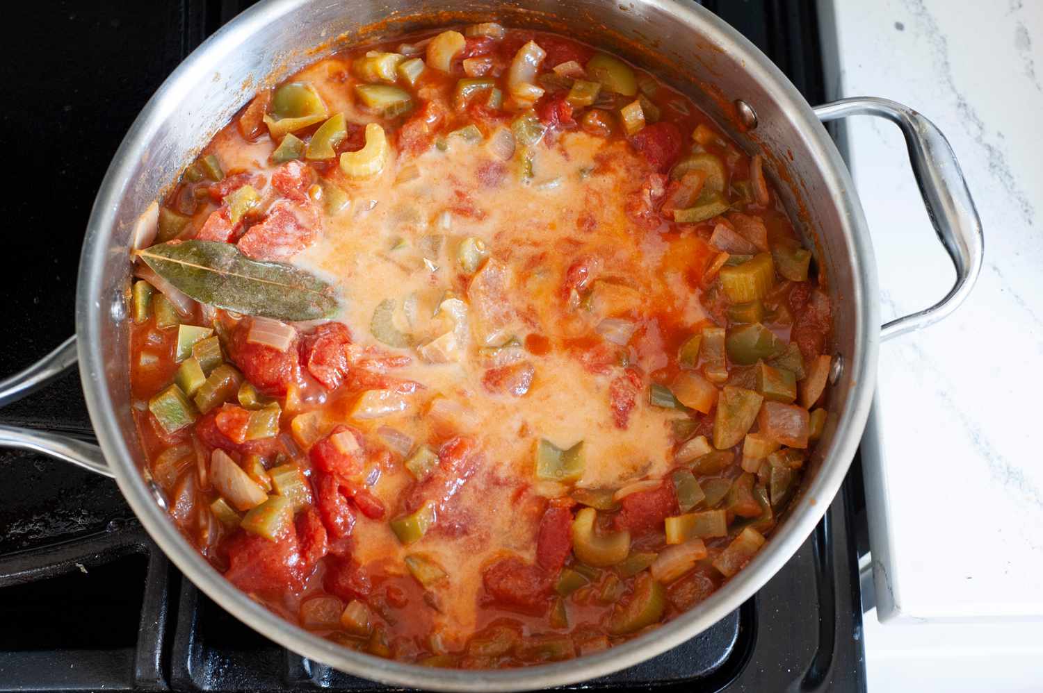 Shrimp creole cooking in pan