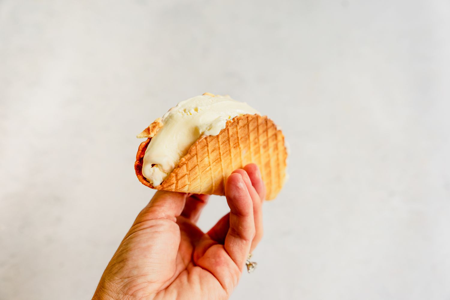 Taco shell filled with ice cream.