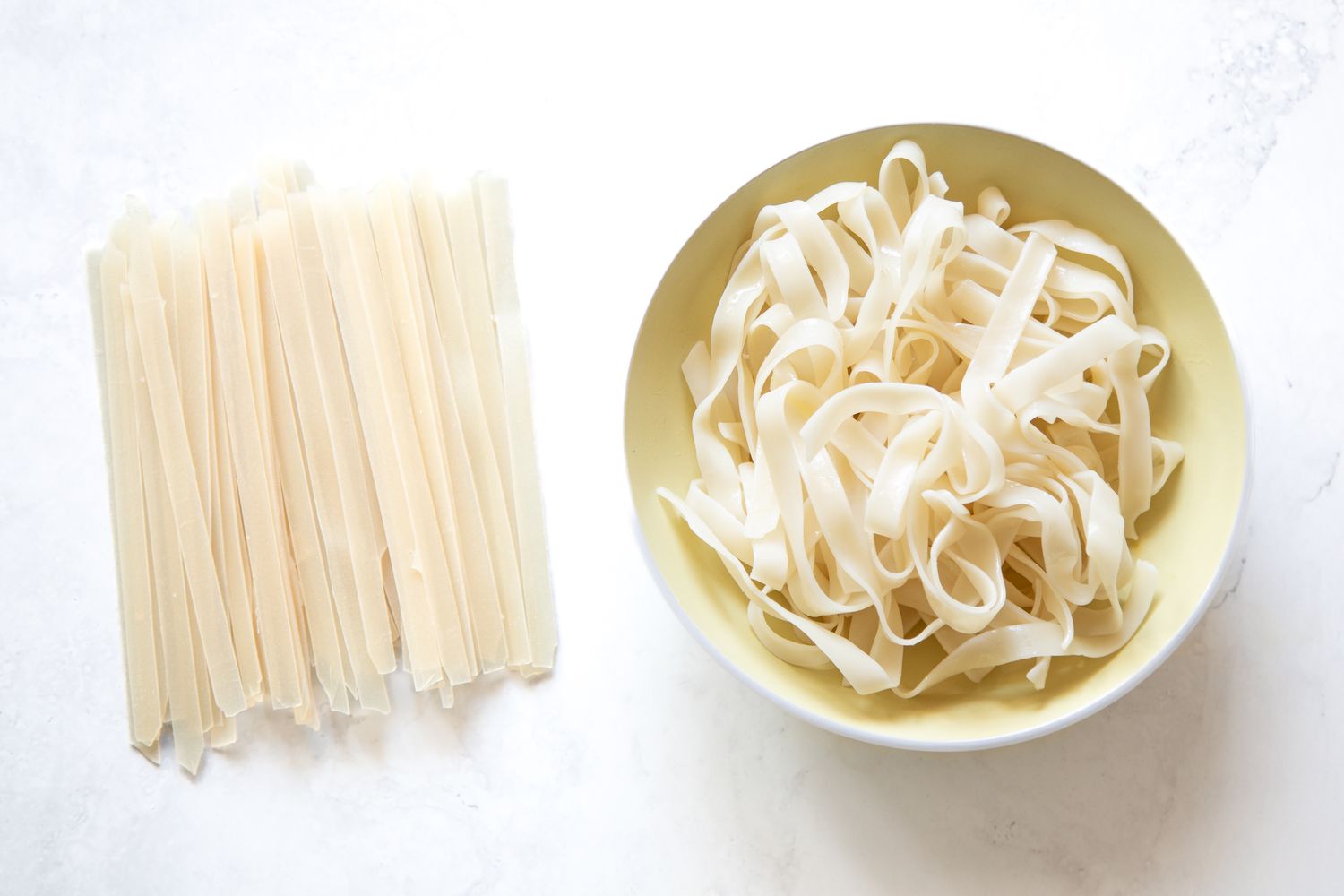 Dried Flat Rice Noodles on the Left and Cooked Flat Rice Noodles in a Bowl on the Right