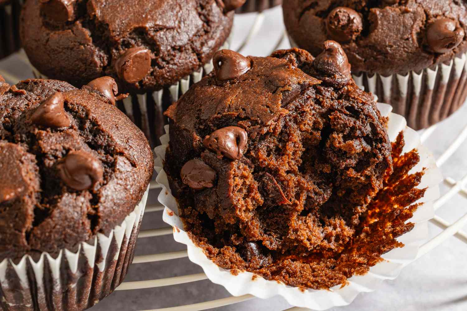 Chocolate muffins with chocolate chips in liners