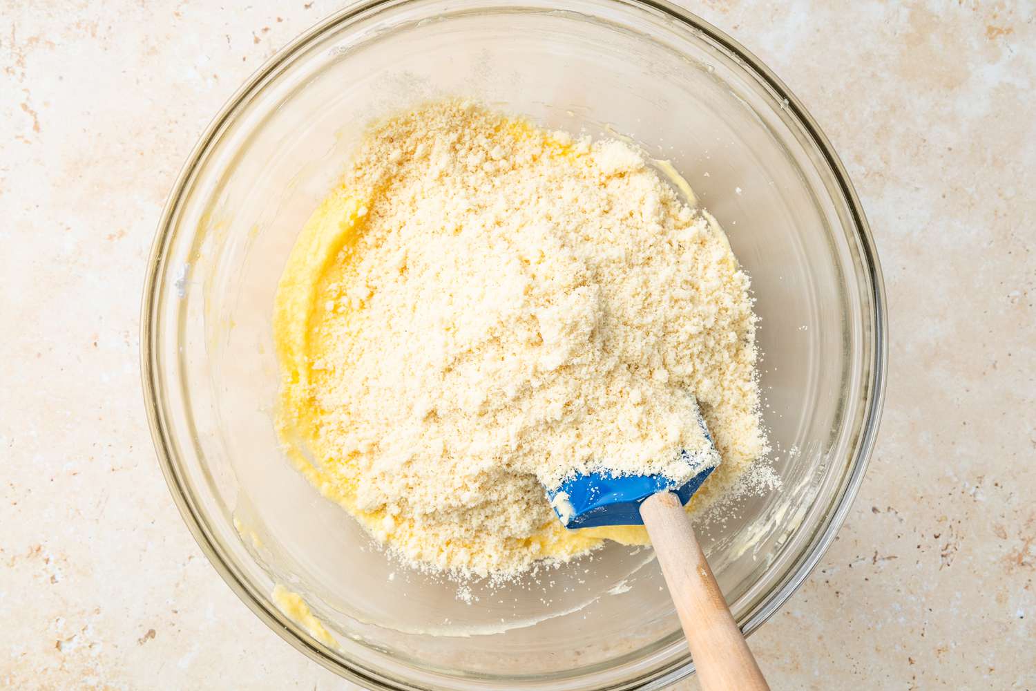 Almond Flour Added to Bowl With the Butter Mixture With the Spatula