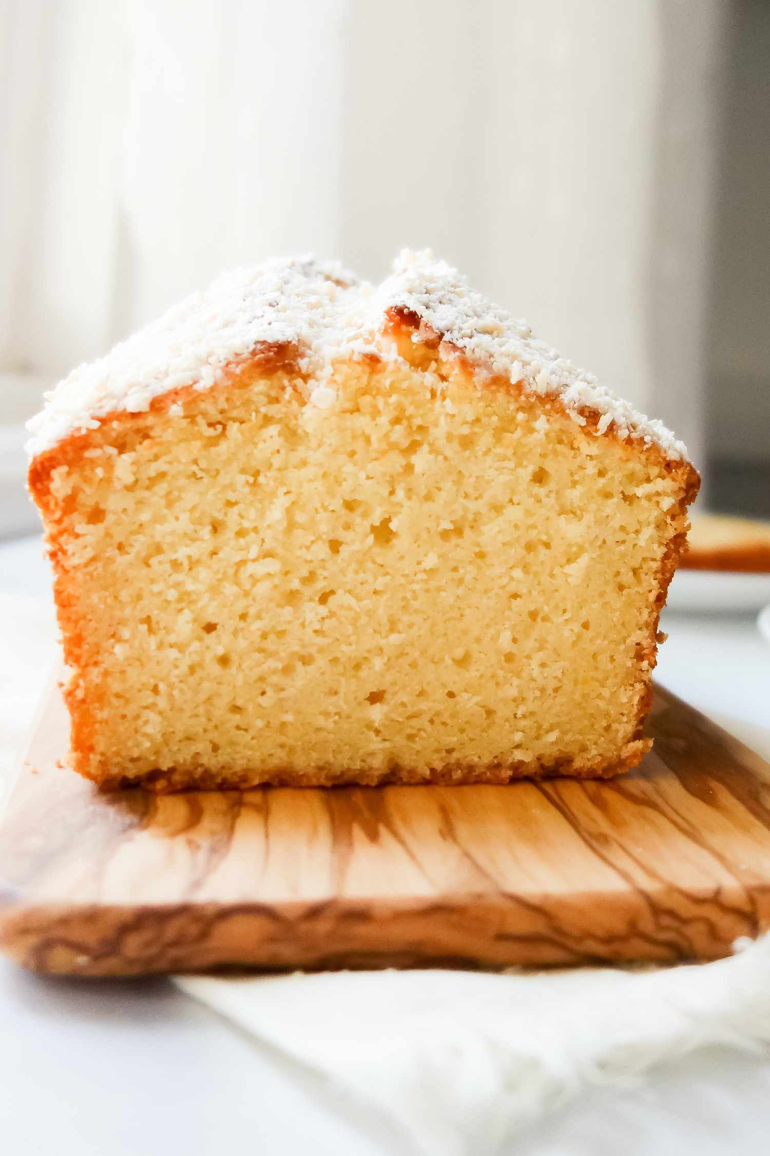 Cut side of coconut pound cake.