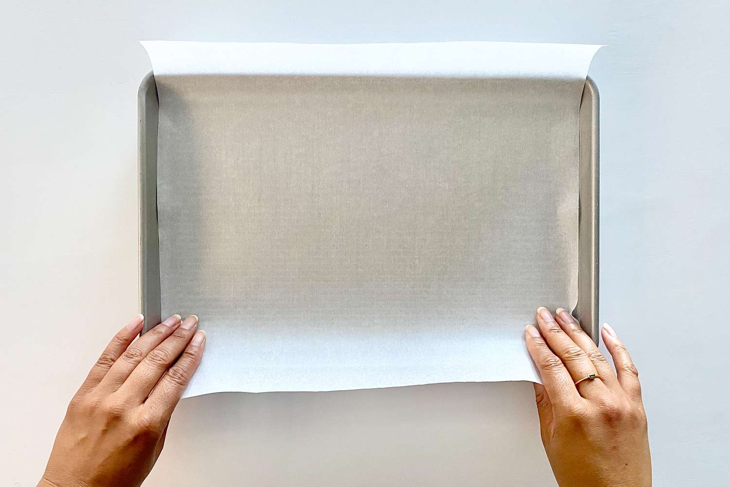 Lining a pan with parchment to make Bar Cookies of the Gluten Free Monster Variety