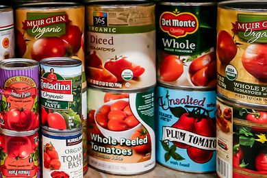 Various canned tomato products from different brands shown together