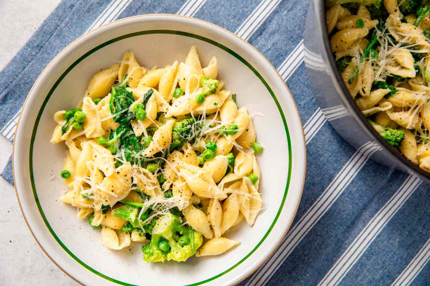 A bowl of pasta with mixed vegetables
