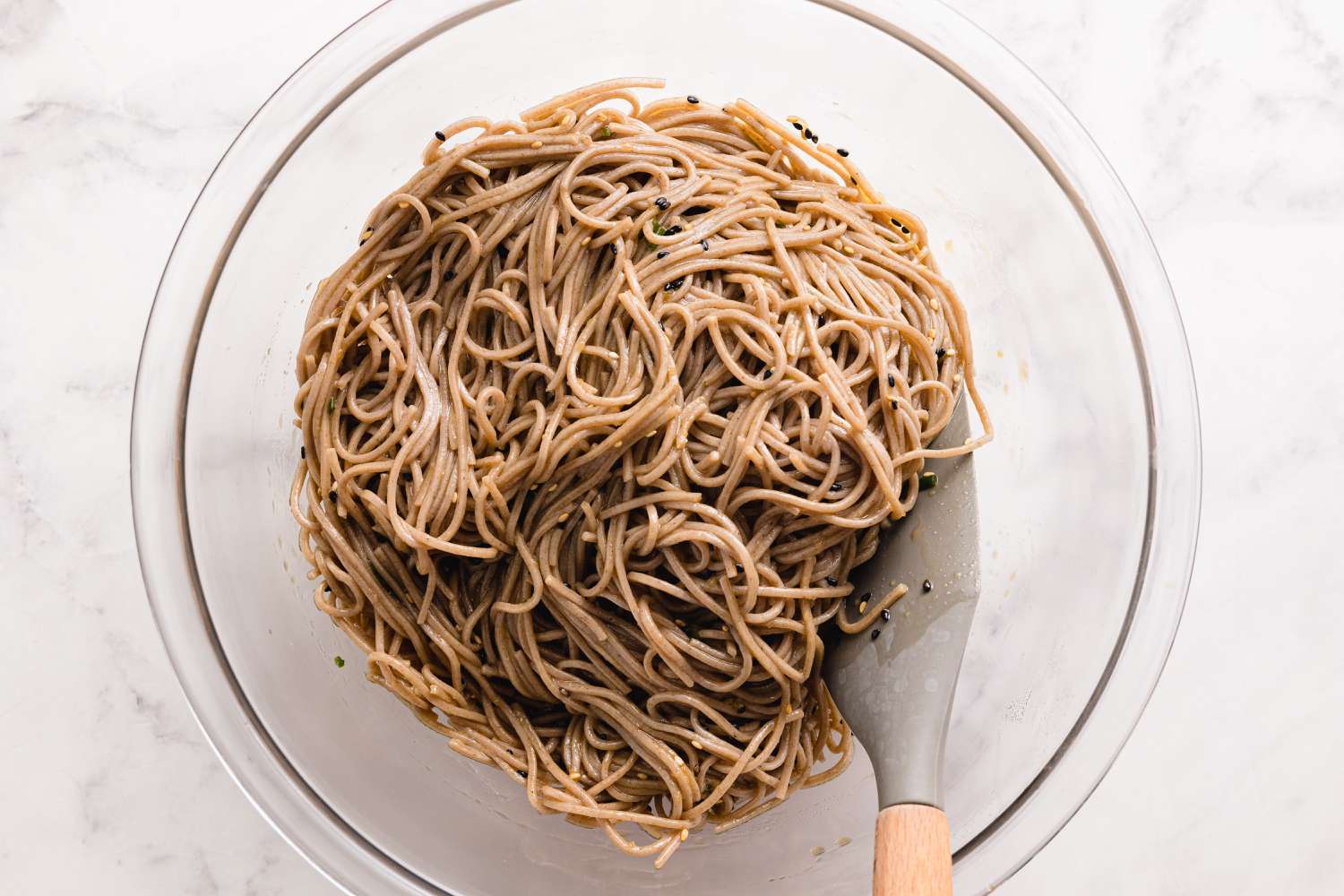 Sesame Soba Noodles in a Bowl with a Spatula