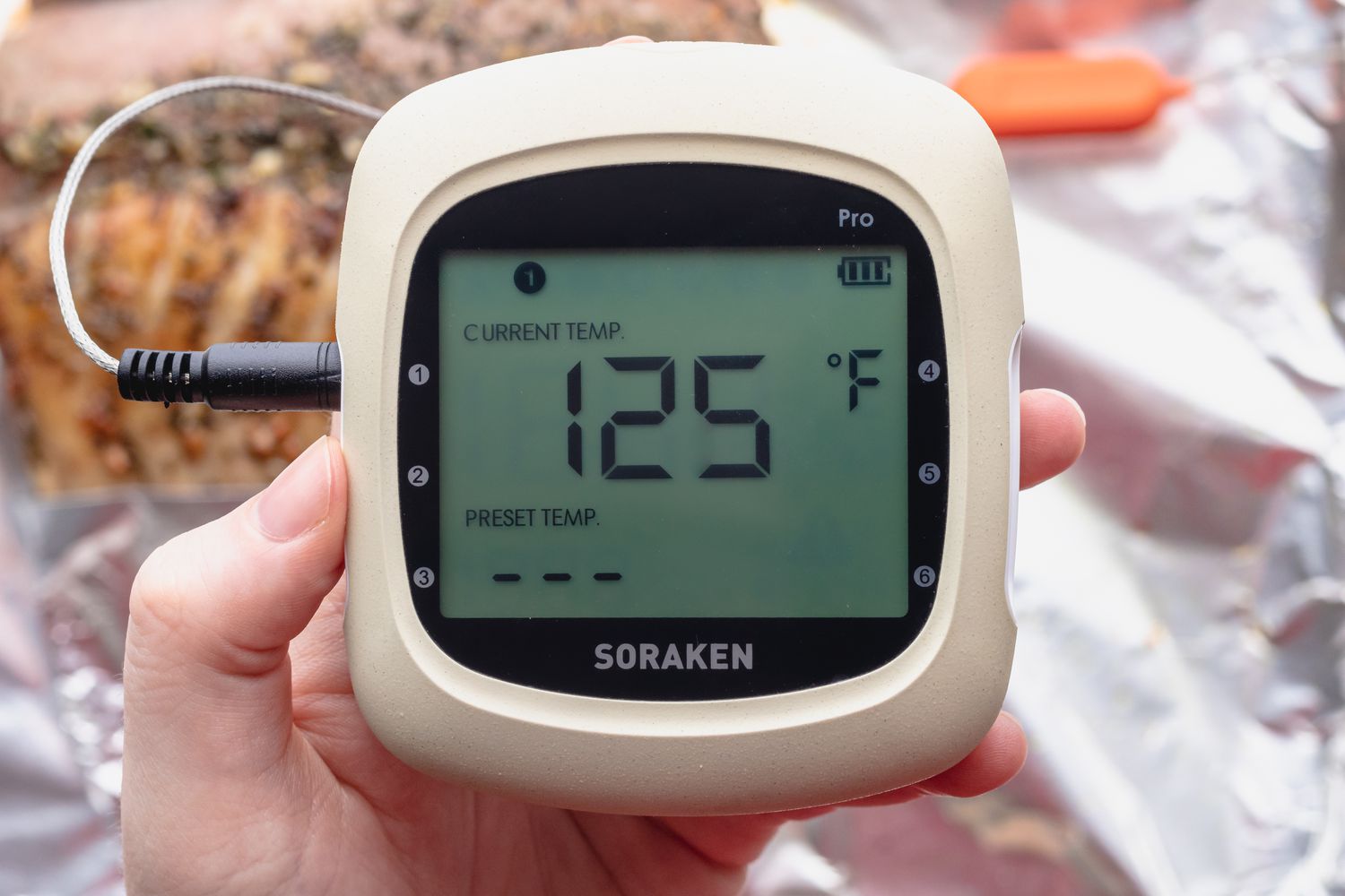 Method shot - thermometer showing 125 degrees