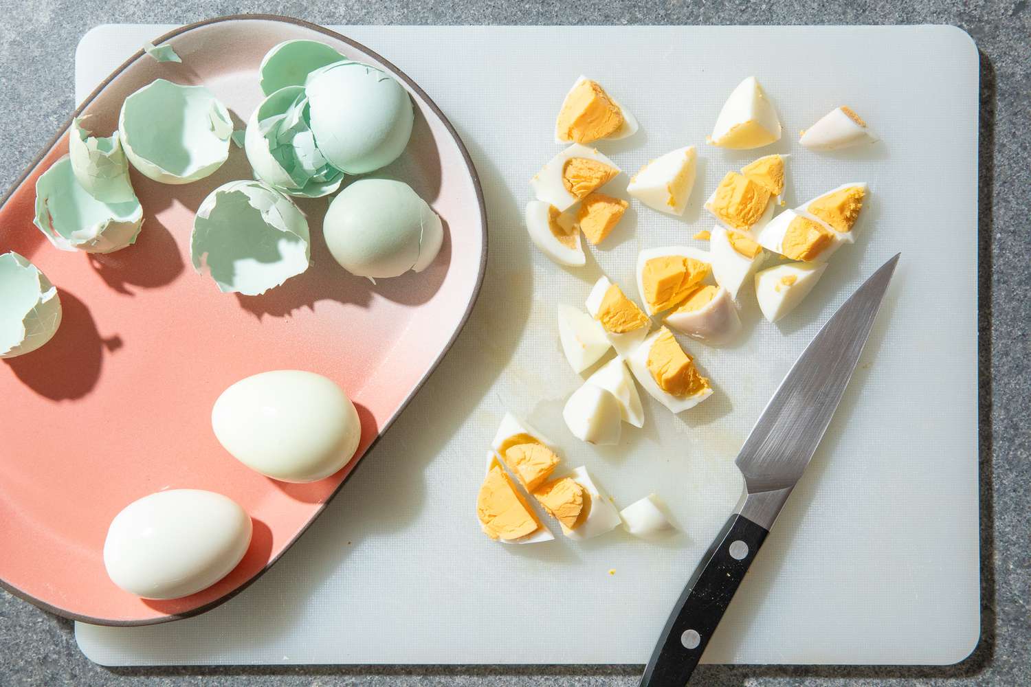 peeled and chopped eggs for olivier potato salad recipe