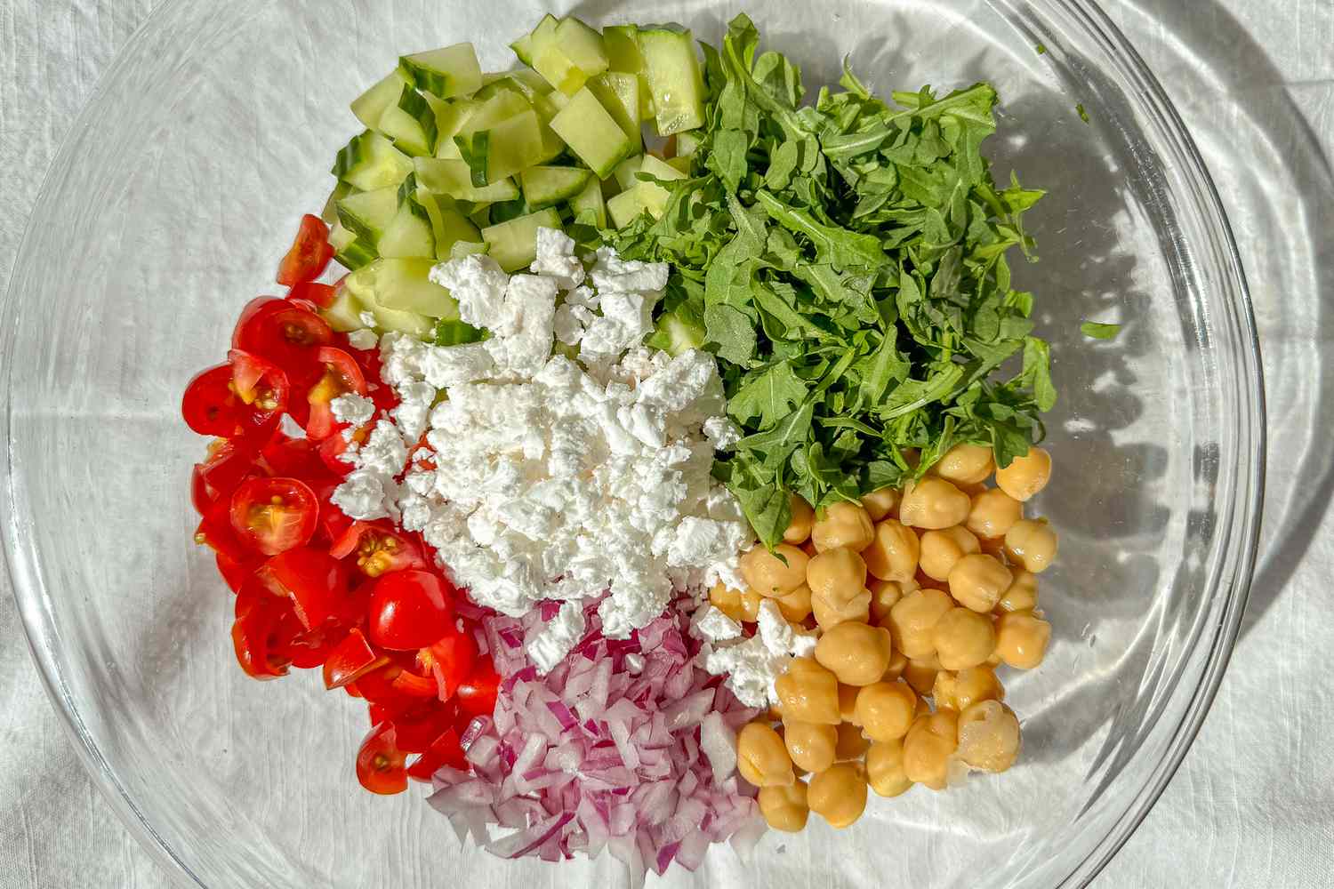 green salad ingredients in a bowl