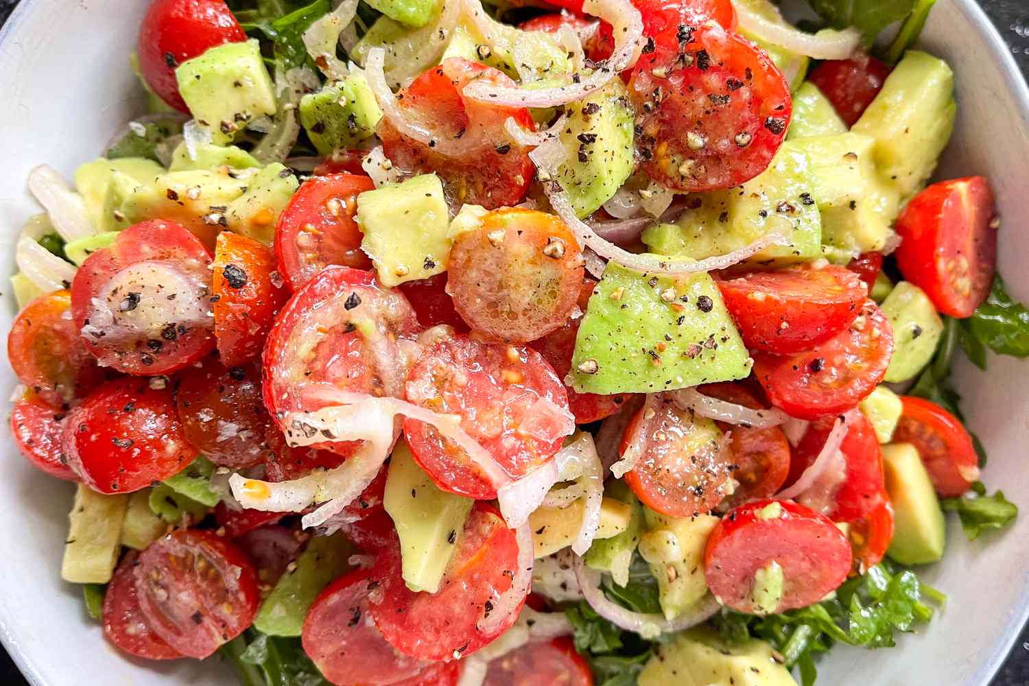 bowl of tomato avocado salad