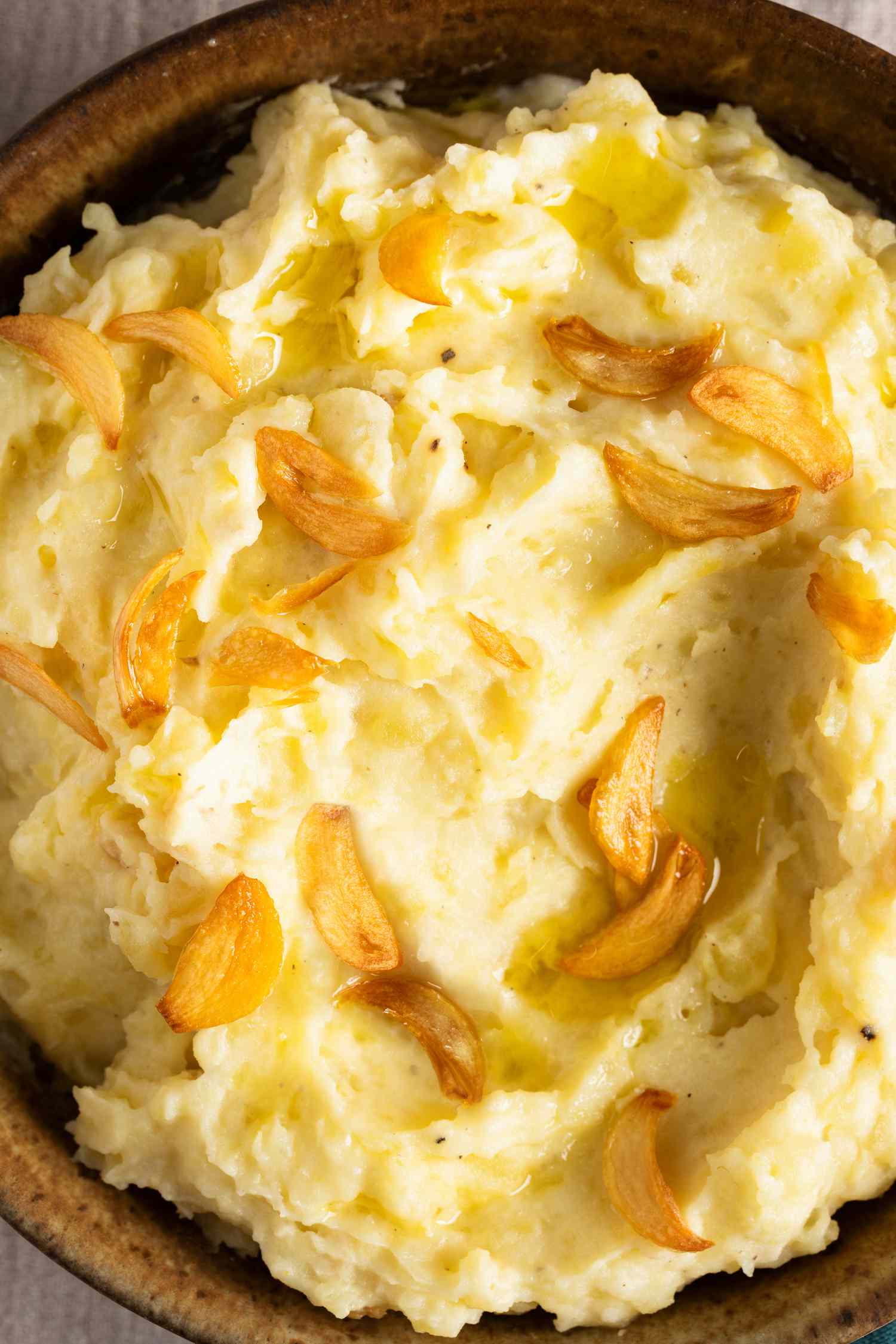 Close up of Too Much Garlic Mashed Potatoes in a brown bowl