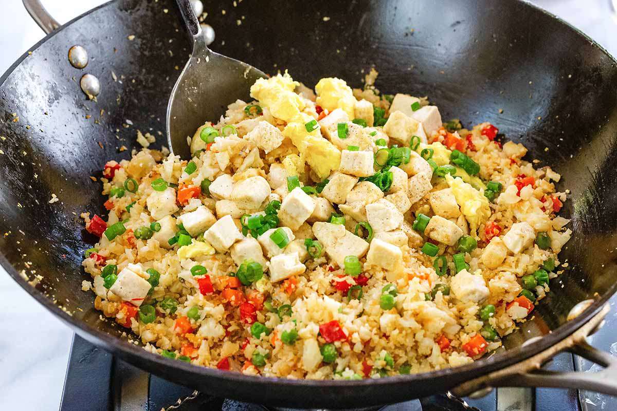 How to Make Cauliflower Fried Rice - vegetable fried rice in wok