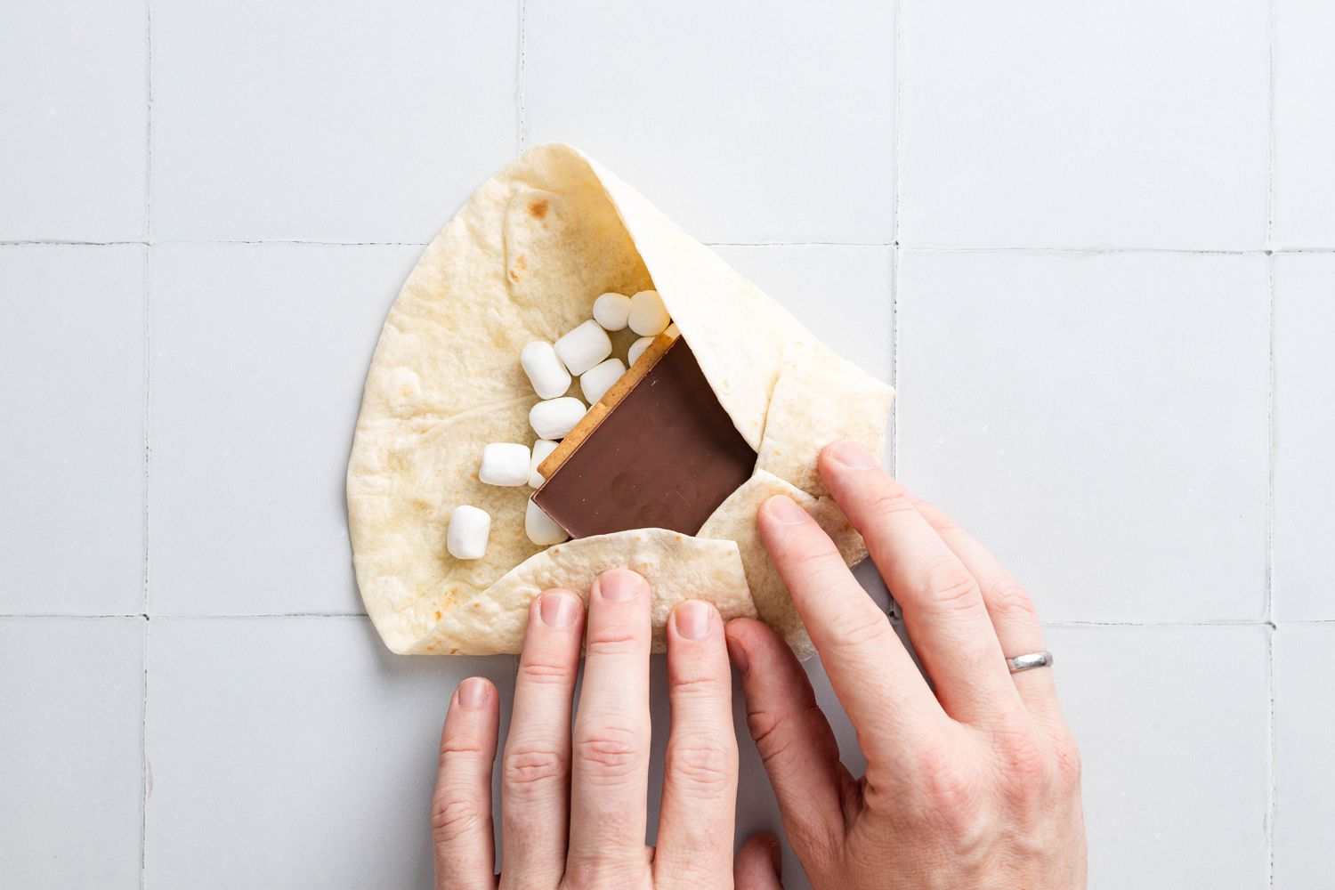 Counter Clockwise, Tortilla Perimeter Folded Towards the S'mores Crunchwrap Filling