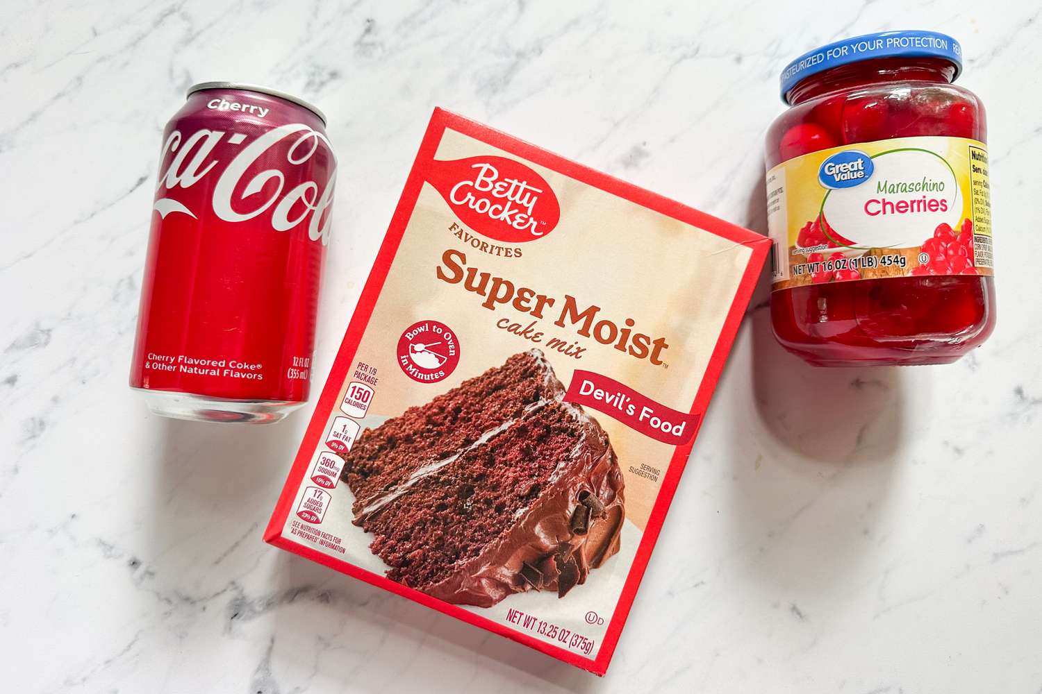 CocaCola can boxed chocolate cake mix jar of maraschino cherries