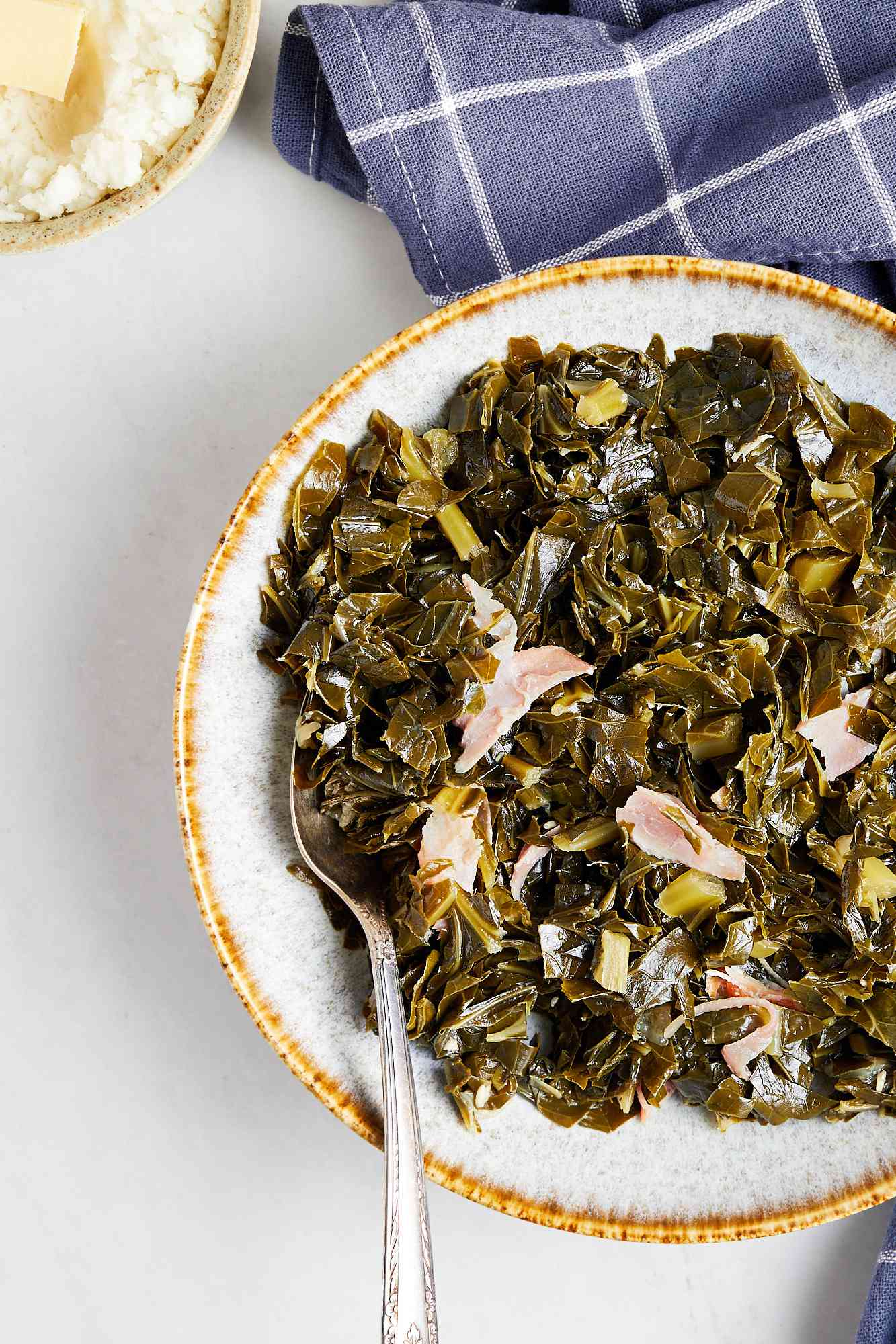 Instant Pot Collard Greens on a Plate with Serving Utensil