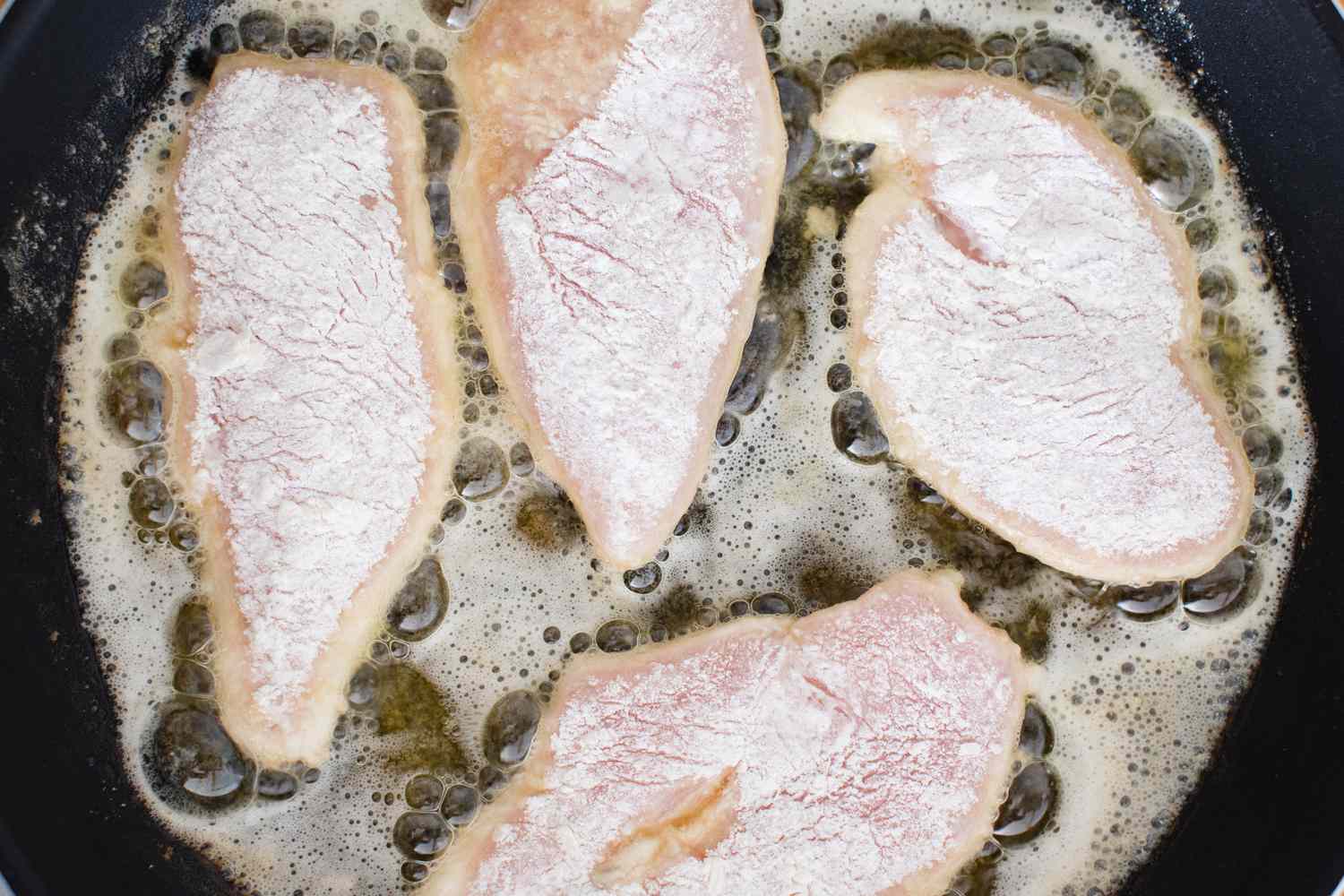 Chicken Piccata Cooking in Oil