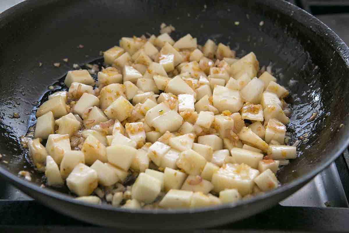 add pears to shallots ginger to make sauce for pork